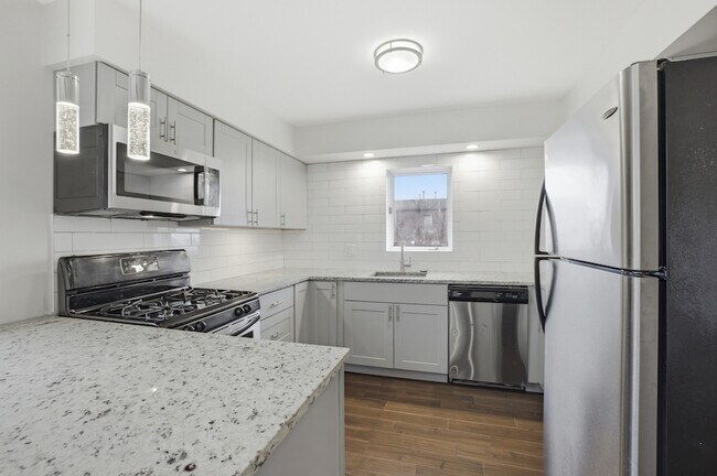 Building Photo - 6555 W Belmont Ave