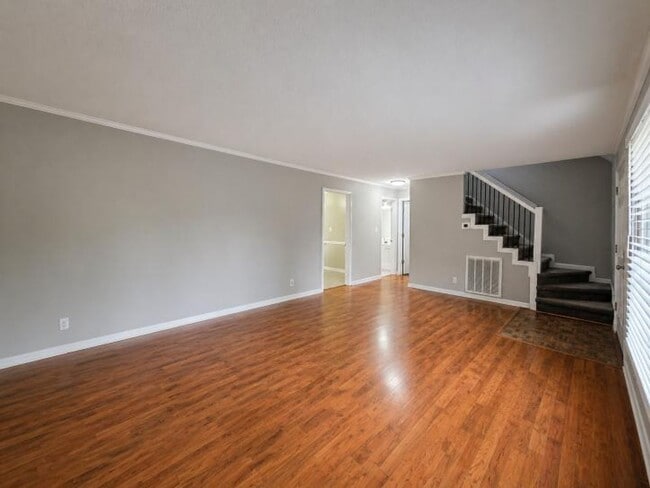 Building Photo - Welcome home to the perfect blend of peaceful country charm and modern city living!