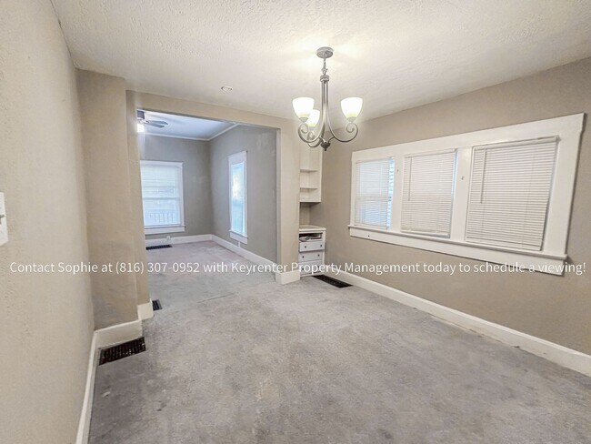 Foto del edificio - 6215 E 9th St