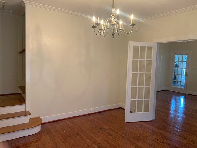 dining room facing living room and stairwell - 1632 Kipling St