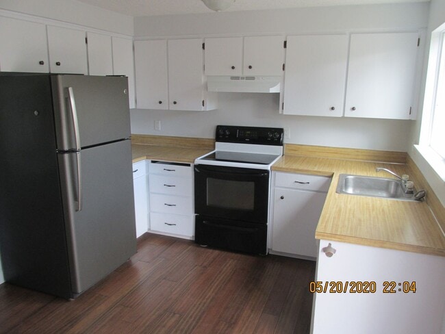 Photo - Great Location !  Walk Score 82**    3 br 1.5 bth , W/D Included, Garage,  Trex deck** Includes y... House