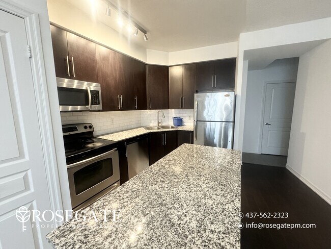 Photo du bâtiment - Modern 1-Bedroom Condo with 1.5 Bathrooms & Balcony – Mississauga