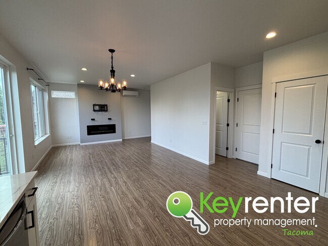 Building Photo - Stylish 4-Bedroom Home with Finished Basem...