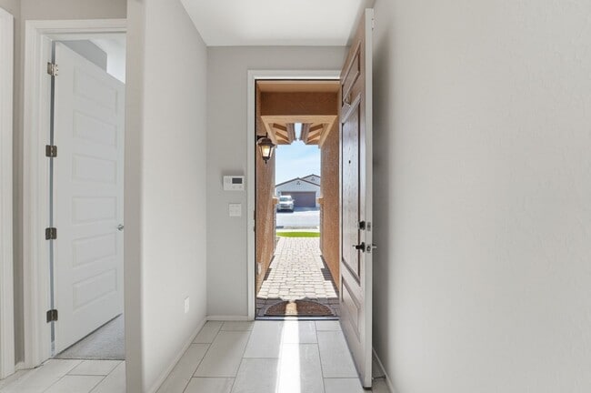 Building Photo - Modern Surprise Home with 3-Car Garage and Designer Upgrades