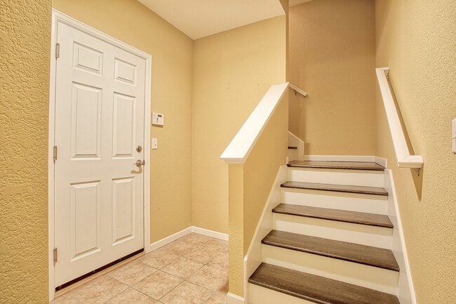 Basement mud room located off garage - 7422 E 7th Ave Unit 14