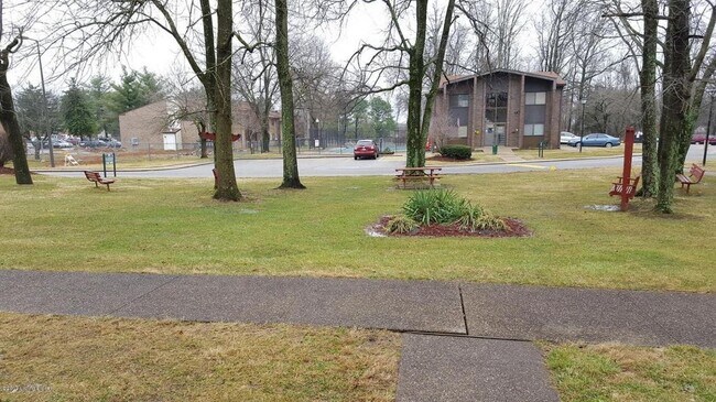 Building Photo - 7008 Wildwood Cir