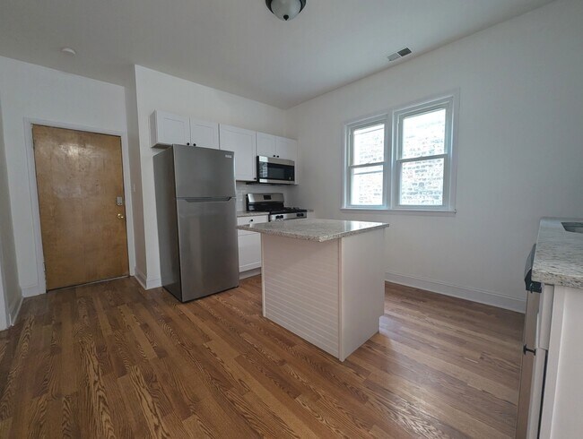 Foto del edificio - 1520 W Melrose St