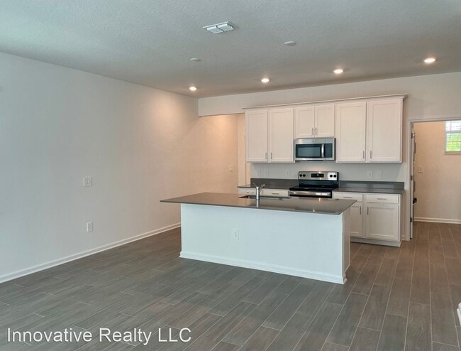 Building Photo - 3 br, 2.5 bath House - 2437 Relaxing Lane
