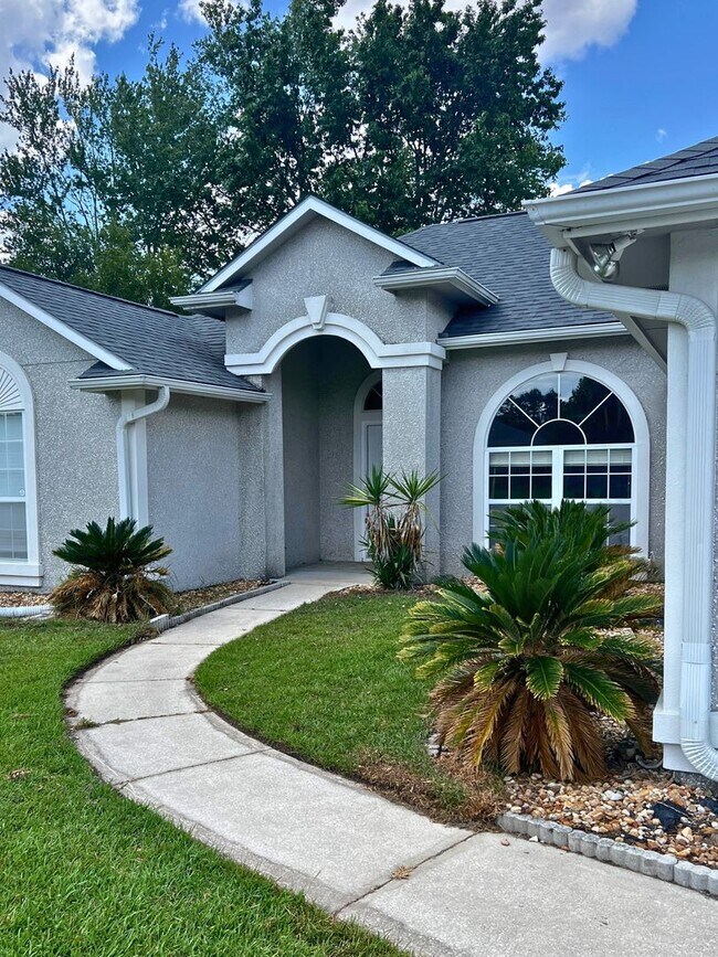 Foto del edificio - Charming 4/2 with fenced in yard