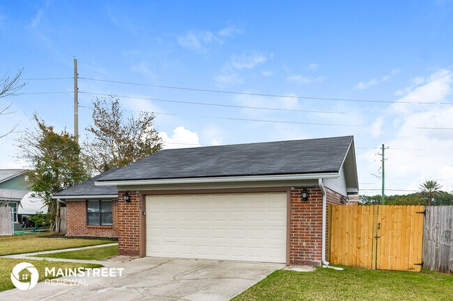 Building Photo - 7009 Swamp Flower Dr N