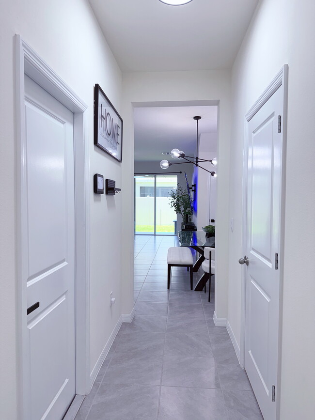 Hallway to Half Bathroom - 17206 Amber Aspen Way