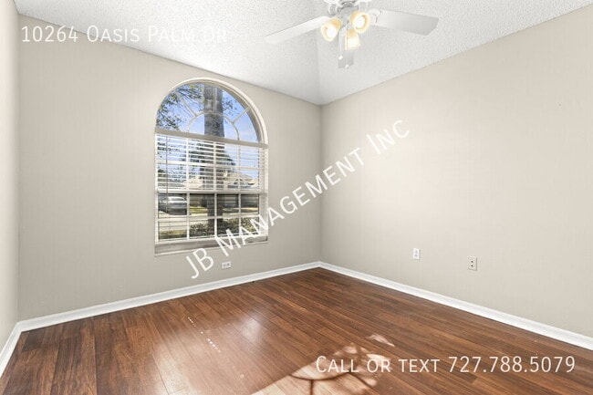 Building Photo - 10264 Oasis Palm Dr