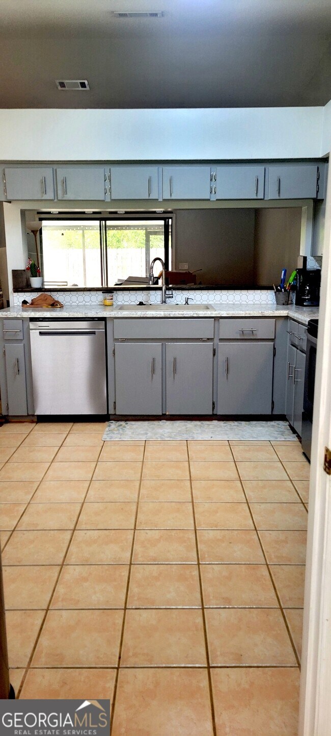 Foto del edificio - 106 Plantation Oaks Dr