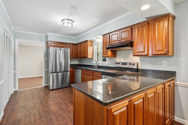 Building Photo - Spacious Oasis! Gorgeous 4 bedroom, 3 full...