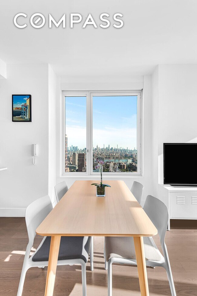 Foto del edificio - Elegant Condo Living with Impressive Views and Exclusive Building Amenities in the Heart of Downt...