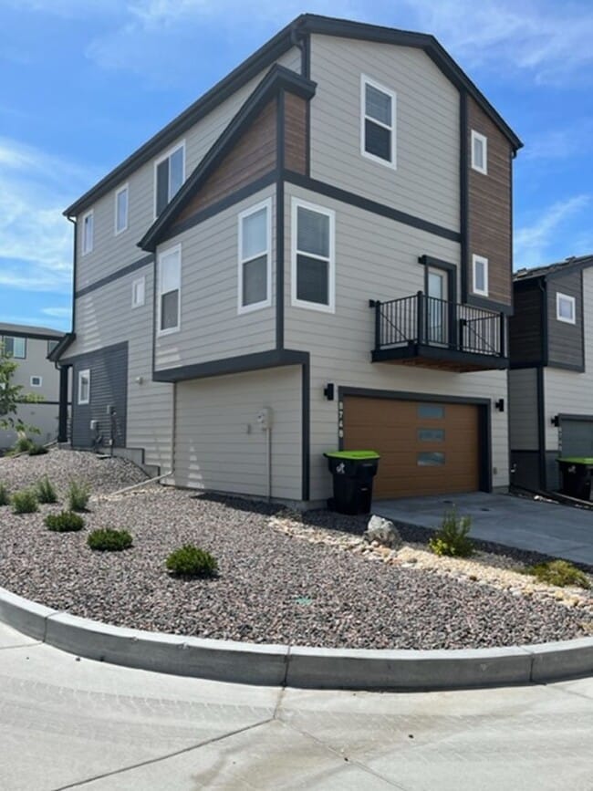 Building Photo - MODERN THREE STORY TOWNHOME WITH 2 CAR GAR...