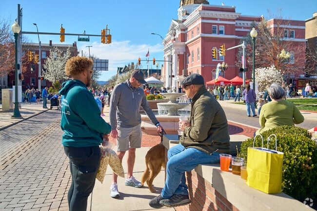 Friends meet at downtown Martinsburg for the St. Patricks Day Celebration.