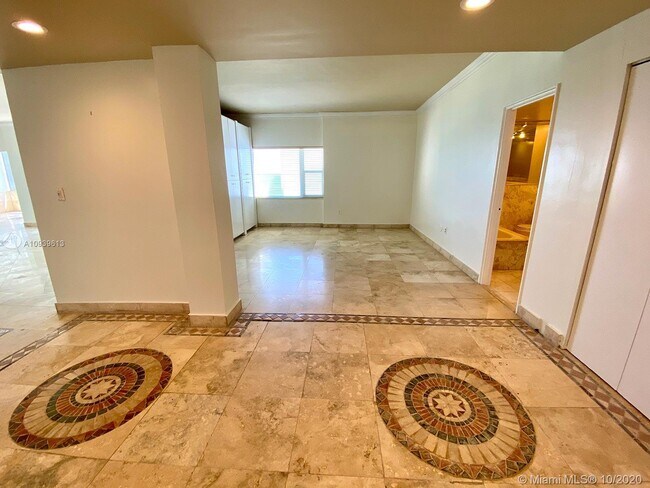 Building Photo - 10245 Collins Ave