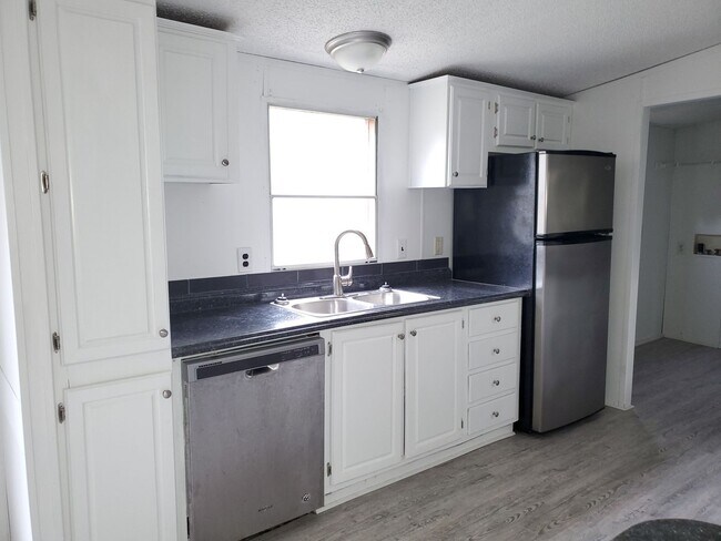 Foto del edificio - 8884 Taylor Woods Circle