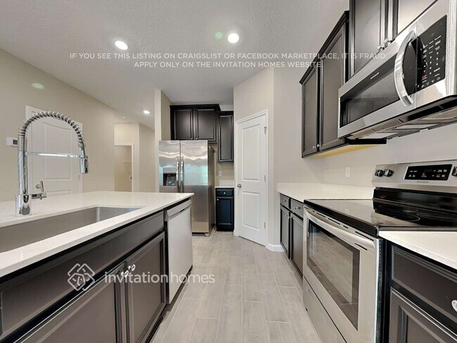 Foto del edificio - 9871 Lemon Balm Wy