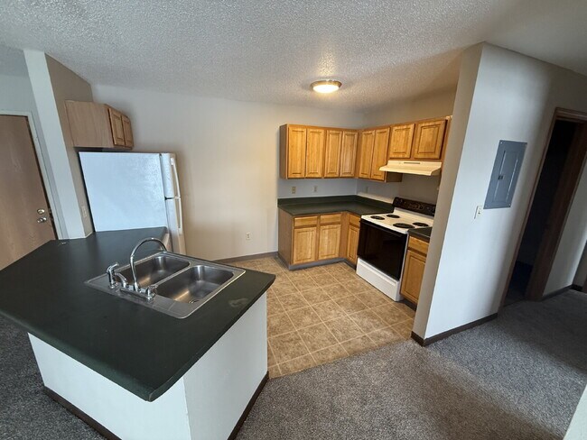Foto del edificio - 3 Bedroom | 2 Bathroom 2nd Floor Unit in Oelwein - AVAILABLE JUNE!