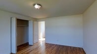 Located at 111 Wayne Rd in Bridgeton, NJ, this two-story home offers a straightforward and functional layout spread across two floors. The interior is finished with warm hardwood flooring throughout, contributing to a clean and classic aesthetic that complements the neutral, light-toned walls.

Bedrooms are well-proportioned, featuring built-in closets with bifold doors for convenient storage. Flush-mount ceiling lighting provides consistent illumination throughout the rooms. The open doorways connecting spaces allow natural light to filter between rooms, creating a bright and airy feel within the home.

The clean lines and simple finishes throughout the space give it a versatile, move-in ready quality, well-suited for a variety of furnishing styles. The two-floor configuration provides a natural separation between living and sleeping areas, offering both functionality and privacy. Overall, the home presents a practical and well-maintained living environment in a residential setting in Bridgeton, New Jersey.