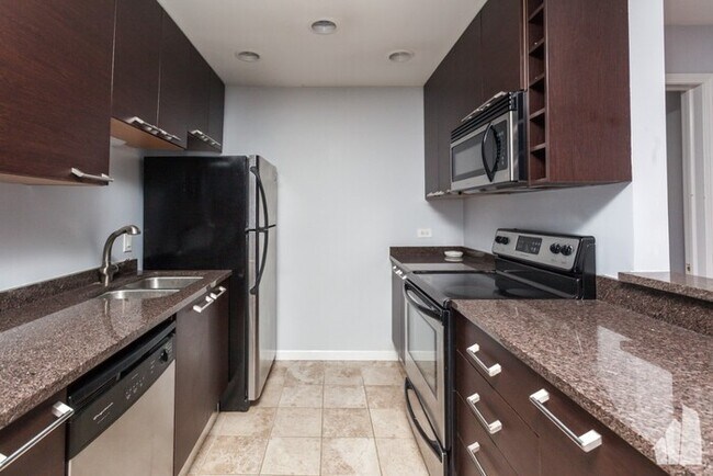 Foto del edificio - Wondrous 1- bedroom with closet space & fi...