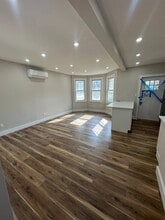 Building Photo - 64-11 65th Pl