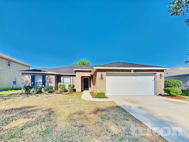 Building Photo - 11238 Justin Oaks Dr N