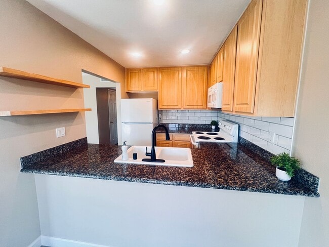 Building Photo - Lowered Price and Move In Special!! Two Bedroom Sunterra Condo in El Cajon remodeled with AC
