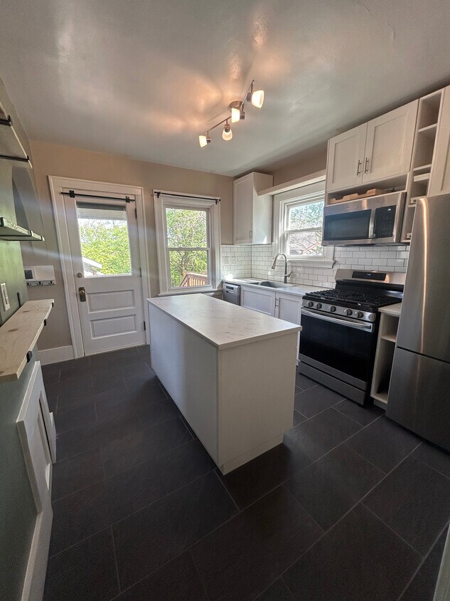 Newly Remodeled Kitchen with Stainless Steel Appliances, Island, Tiled Floors & Breakfast Nook - 4524 Orkney Ave (Cincinnati, OH)