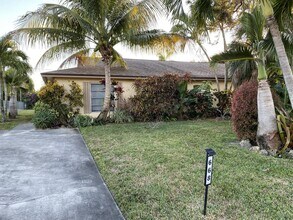 Building Photo - 668 98th Ave N