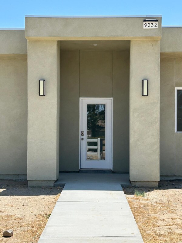 Building Photo - 9232 E Ave T 6