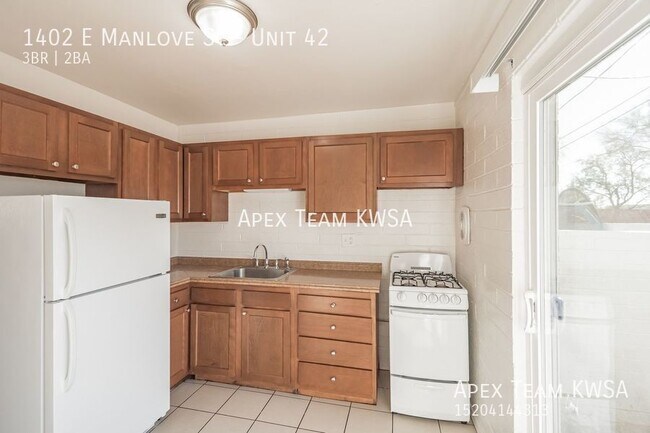 Building Photo - 1402 E Manlove St