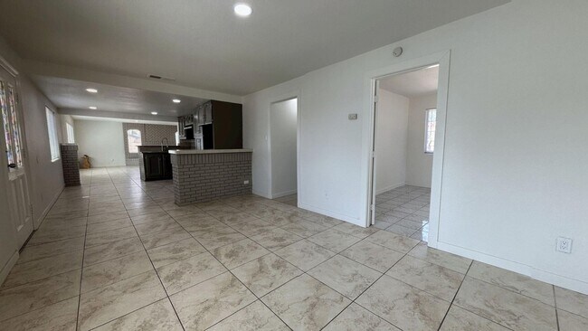 Building Photo - PRICE REDUCTION! Spanish Style 3 Bedroom 2...