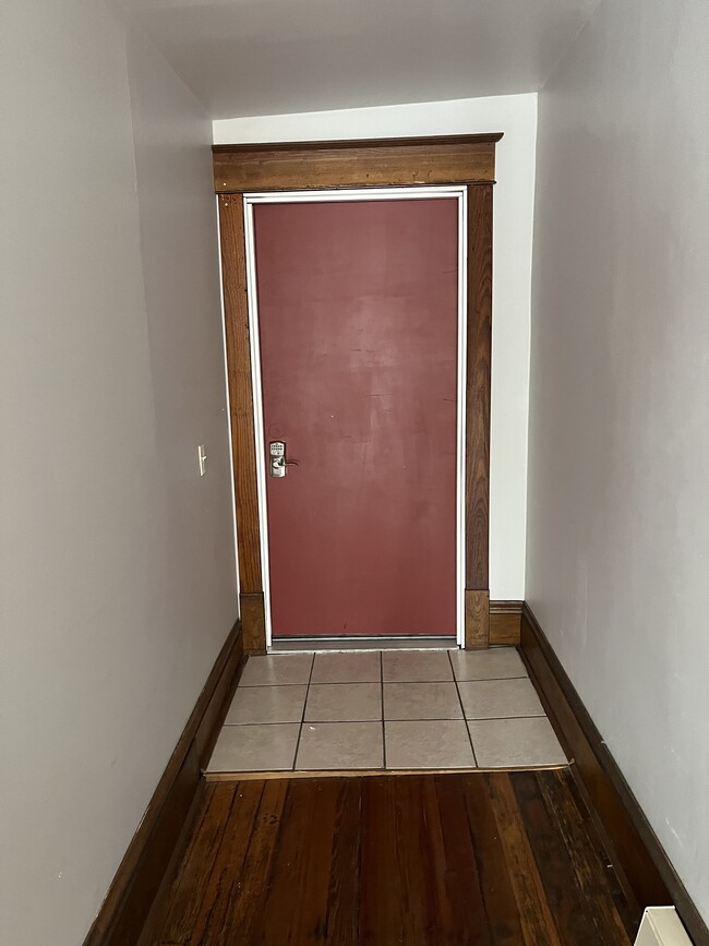 Entry door to second floor apartment - 117 N Front St