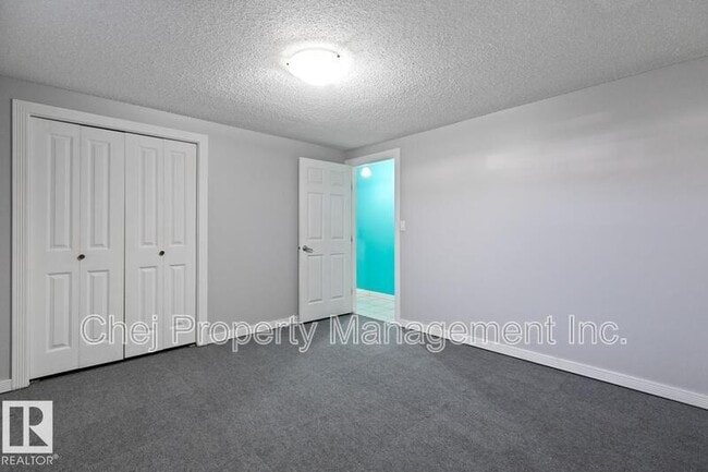 Building Photo - 8007-8128 128 Ave NW