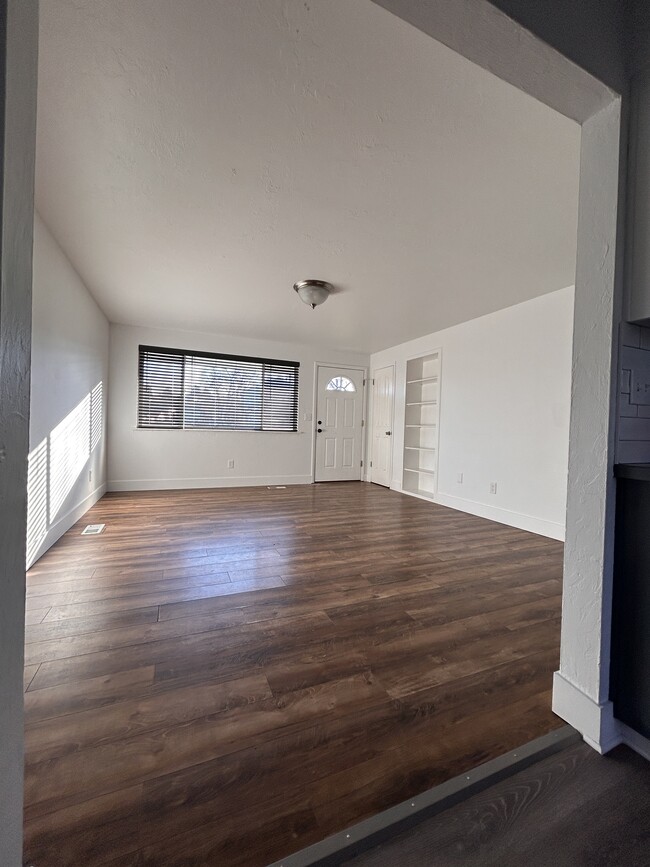 Living room, cost closet and built in shelves - 1630 W Wright St