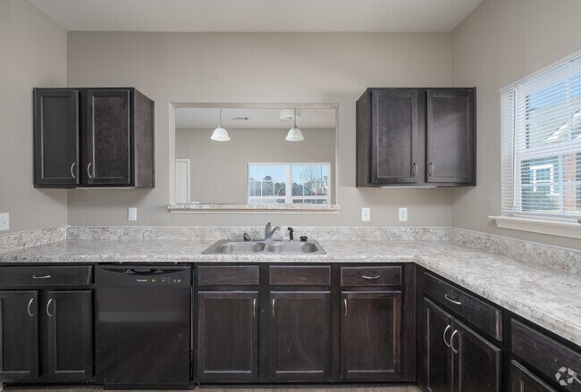 2 habitaciones, 1 baño - 1069 pies cuadrados - Cocina - The Cottages at Baynes Creek - 55+ Community