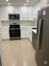 Building Photo - 10777 W Sample Rd
