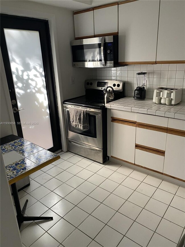 Building Photo - 8950 Collins Ave