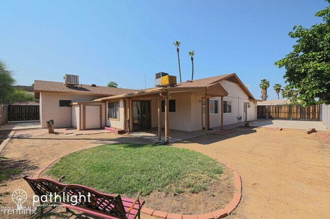 Foto del edificio - 3 br, 2 bath House - 3401 Dahlia Drive UNIT