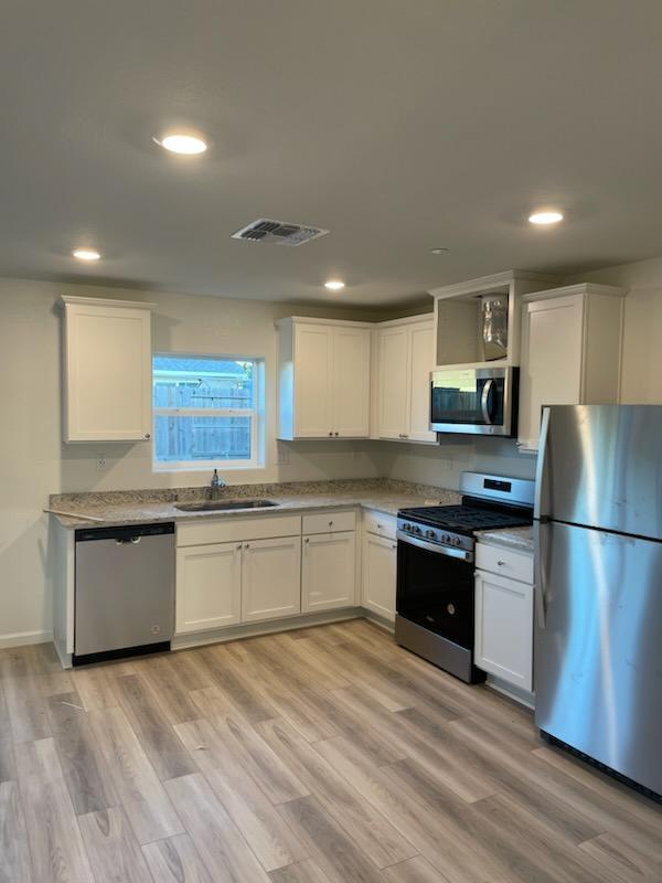 Building Photo - 5557 Sunhaven St
