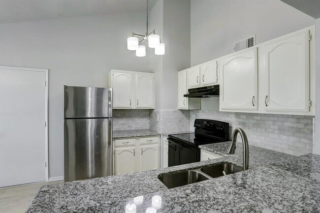 Building Photo - 24402 Running Iron Dr