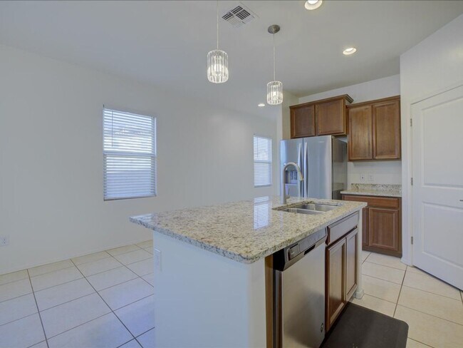 Building Photo - Bright & Spacious 3-Bedroom Home with Open-Concept Living and Community Pool