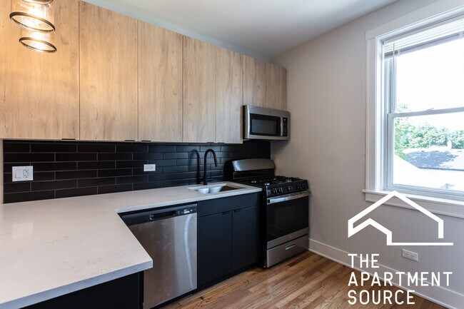 Foto del edificio - 4007 N Lowell Ave