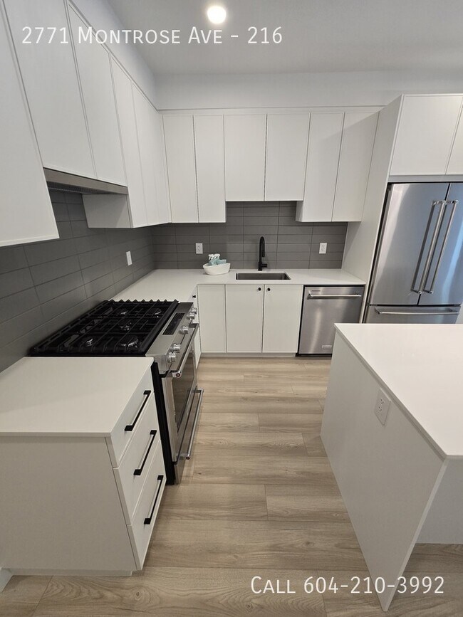 Photo du bâtiment - Brand New Condo in the Rail District