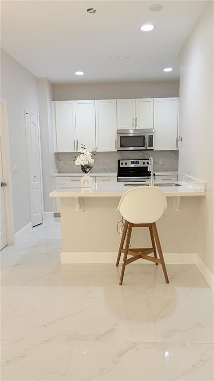 Foto del edificio - 13565 Fountainbleau Dr