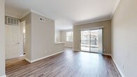 This 680 square foot apartment in Colorado Springs offers a thoughtful layout that maximizes space and functionality. The single-floor design includes one bedroom, measuring 150 square feet, one bathroom, and an open-concept kitchen and living area. The property boasts modern finishes throughout, with a harmonious blend of materials including plush carpeting in the bedroom and sleek wood-look flooring in the main living spaces.

The kitchen is a standout feature, showcasing white cabinetry, stainless steel appliances, and a stylish hexagonal tile backsplash. It opens seamlessly to the living area, creating an ideal space for entertaining. Large windows, including a sliding glass door leading to a private balcony, flood the apartment with natural light and offer outdoor views.

The bathroom is well-appointed with a single vanity, ample storage, and a shower/tub combination. The bedroom, while compact, offers sufficient space for a comfortable retreat. Additional amenities include a closet for storage and a ceiling fan for improved air circulation.

Overall, this apartment presents a modern and efficient living solution, perfect for those seeking a low-maintenance lifestyle in a prime Colorado Springs location.