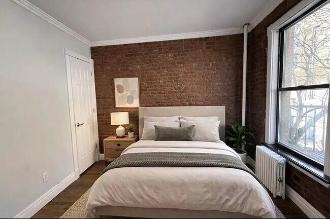 Foto del edificio - 410 E 13th St